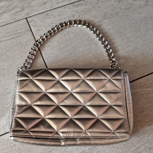Quilted padded silver hand - quilted,