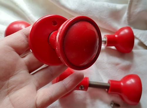 Red bakelite door knobs - red,