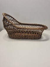 ANTIQUE WICKER DOLL MOSES