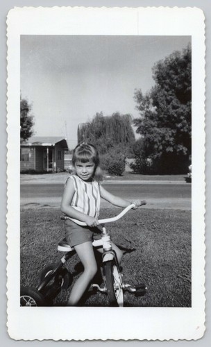 1950s cute little girl riding - 1950s,