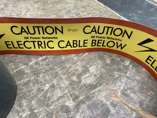 Caution electric cable below - electric,