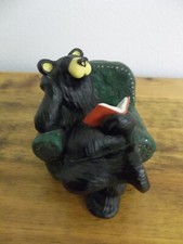  BOB  READING A BOOK IN LOUNGE CHAIR