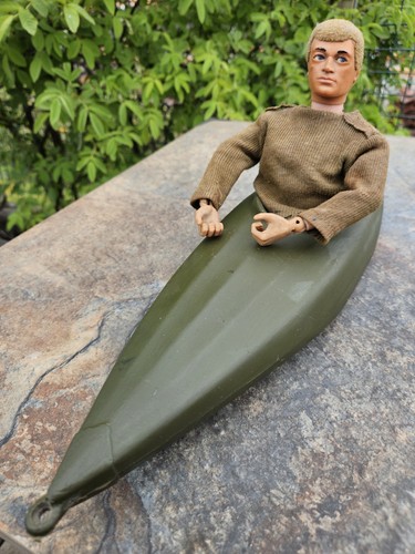 Vintage action man with canoe - with,