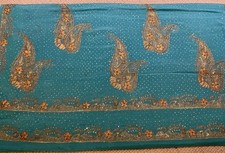 Turquoise Saree With Gold