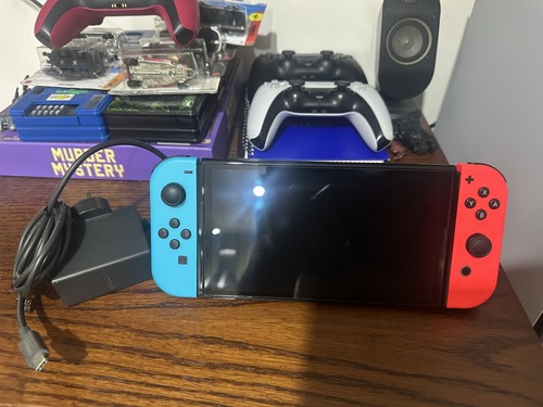 Nintendo switch oled 64gb - nintendo,