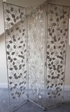 Ornate folding room divider