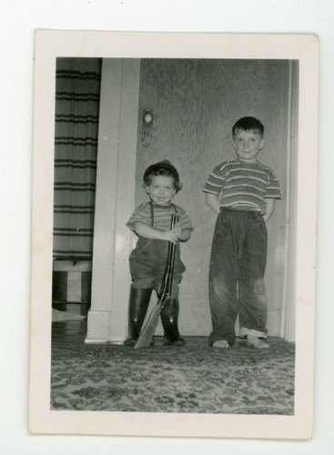 Boy holding toy gun rifle - gun,