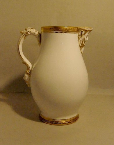 Antique porcelain mask spout - porcelain,