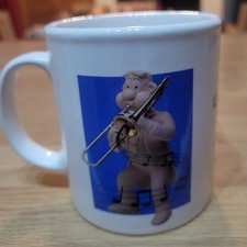 Vintage 1990s Lurpak mug Douglas on the trombone It's  matter of taste Kilncraft