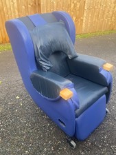 CAREFLEX TILT IN SPACE CARE CHAIR WITH RETRACTABLE LEG SUPPORT