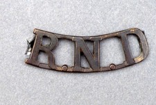 WWI "R.N.D" (Royal Naval Division)  bronze shoulder title.