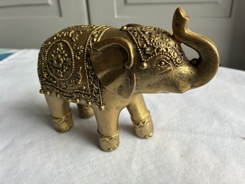 Golden elephant ornament with - golden,