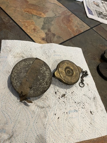 Old petrol can lids - old,