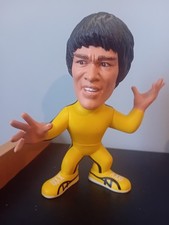 Bruce Lee figures (four total)