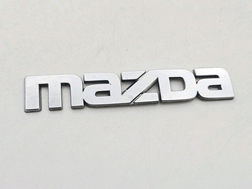 Mazda logo badge - badge, sign