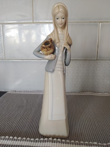 Lady with water jug - , approx