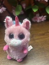 pink unicorn plush toy from