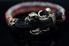 An exclusive bracelet with a skull bead and a stylish catapult lock with skulls