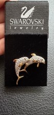Genuine Swarovski dolphins
