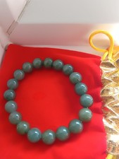 BEAUTIFUL real GREEN JADE ELASTICATED BRACELET. BEADS-10mm. good gift for lover