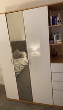 Three Door Five Drawer Mirrored Wardrobe