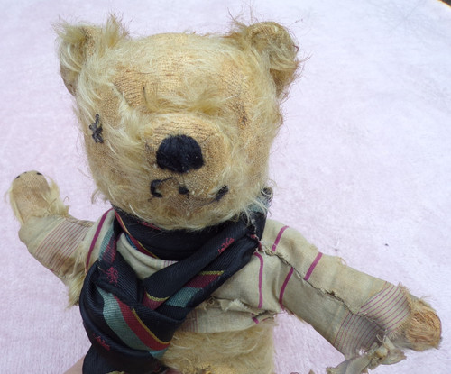 Antique teddy bear poorly - -,