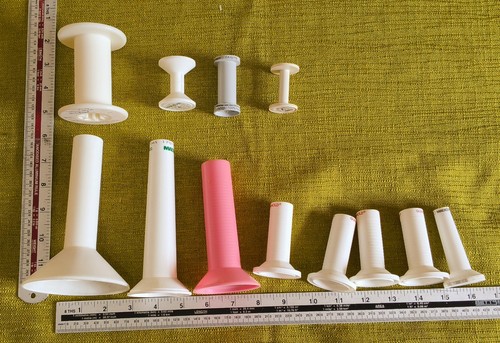 Empty plastic spools - empty,