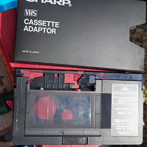 Sharp vhs cassette adaptor - sharp,