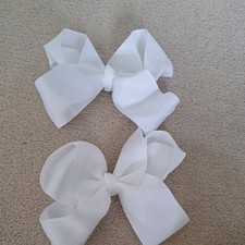 Pair of White Clip In Hair
