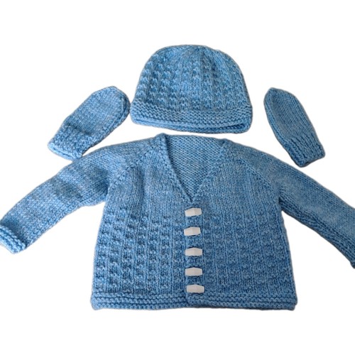 Hand knitted baby boy - hand,