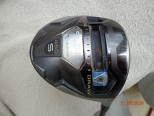 Taylormade golf driver adjustable for fade or draw
