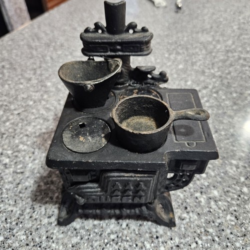 Vintage cast iron queen - iron,