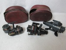 3 Fishing Reels and 2 Brown Cases. Paver, Mitchell 1160, Abu 601M