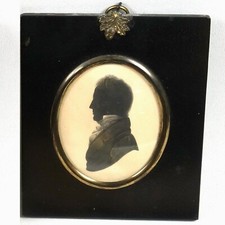 An antique Georgian painted  framed Silhouette Portrait Miniature C.19thC