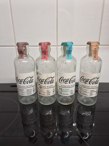 Coca cola signature bottles - coca-cola,