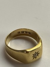 Heavy Gents 18ct gold signet ring with a star-set diamond, weighs 11g 