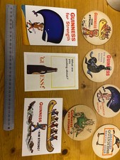 vintae guinness post cards snd beer mats