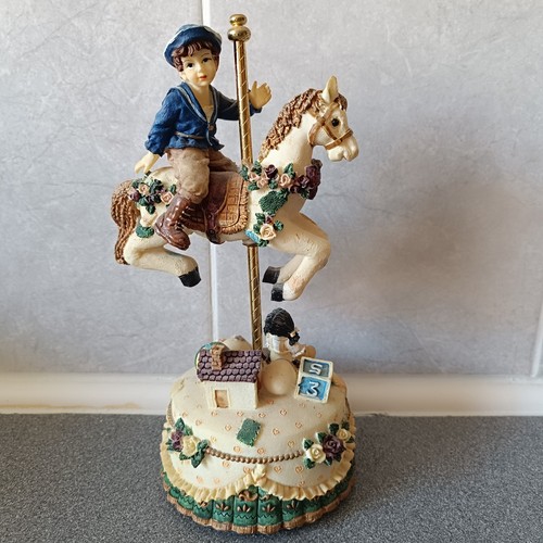 Vintage carousel music box boy