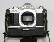 Canon AV-1 35mm SLR Film Camera + Canon 50mm F2 FD lens. Winder