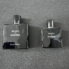 Two Empty Chanel Bottles Bleu