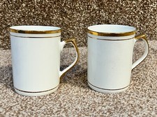 VINTAGE PAIR OF WHITE FINE BONE CHINA MUGS CUPS GOLD RIM