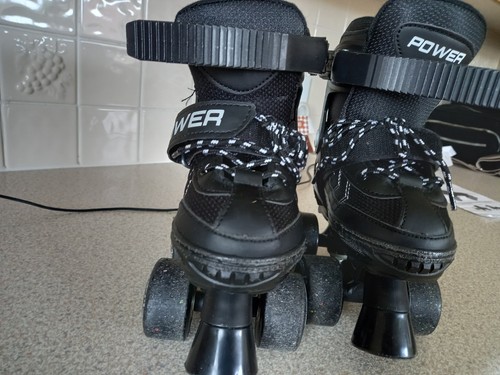 Power adjustable quad skates - adjustable,