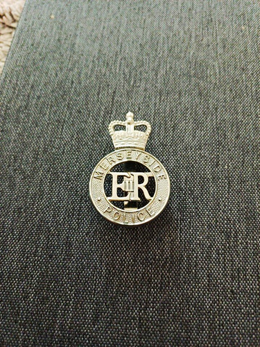 Merseyside police cap badge - police,
