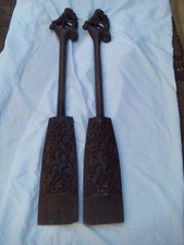 PAIR OF VINTAGE WOODEN ORNATE HAND CARVED AFRICAN TRIBAL PADDLES . M3713