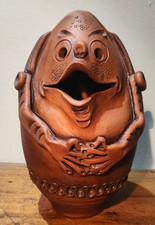 Grotesque face pottery figure - grotesque,