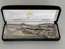CASED PAIR OF SILVER PLATED GRAPE SCISSORS WITH FOXES ON THE SIDES