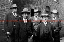 F014250 Men Dressed In Hats and Dark Suits UK 1920s