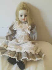 Two old dolls rag/porcelain needing a new home that can give care and attention