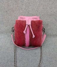 Sherene Melinda Lou Lou Pouch Springbok Hair-on-hide pink genuine leather bag.