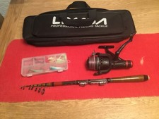 AP , CKR50  Fishing Reel & 2.4 m ( 8ft ) telescopic rod & lures in carry bag .